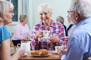 The Gardens at Quail Springs | Seniors Having A Conversation Over Breakfast