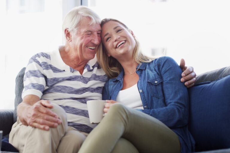 The Gardens at Quail Springs | Senior man sitting with his daughter